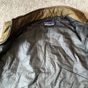 Patagonia men’s vest. Tan in excellent condition.